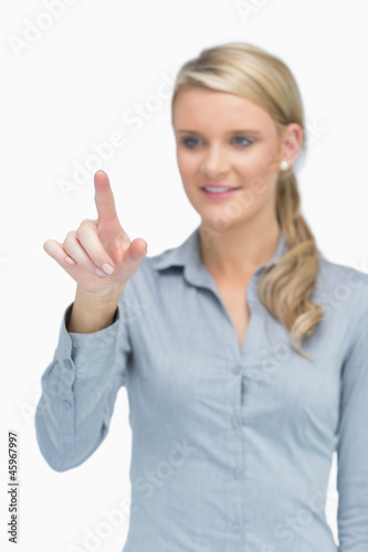Businesswoman pointing at something