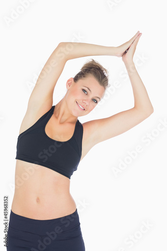Woman stretching in yoga pose
