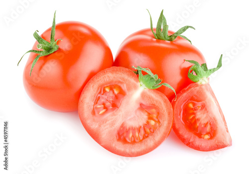 Two Fresh Juicy tomatoes, cut in half and a slice Isolated on wh