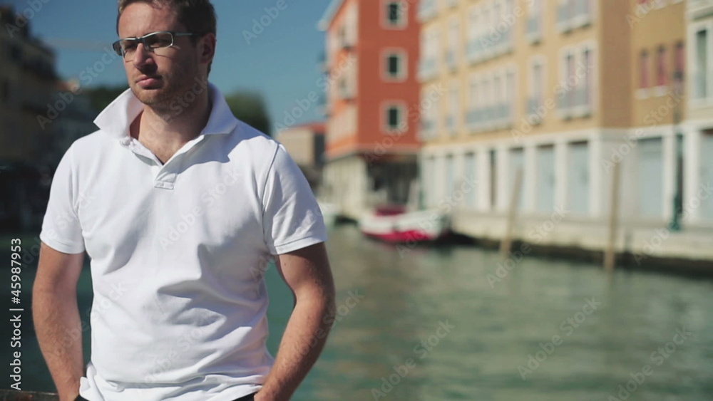 Portrait of serious looking rich manstandind in Venice Portrait of serious looking rich manstandind in Venice