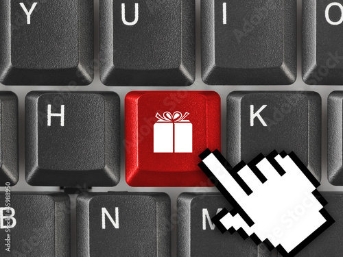 Computer keyboard with gift key
