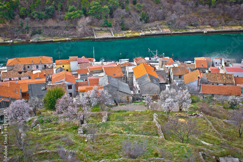 Novigrad Dalmatinski house rooftops and channel photo