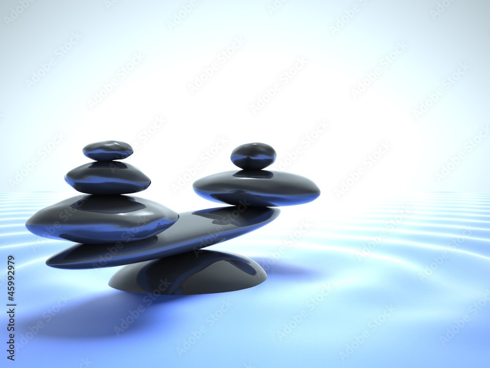 Zen stones in water, blue sky