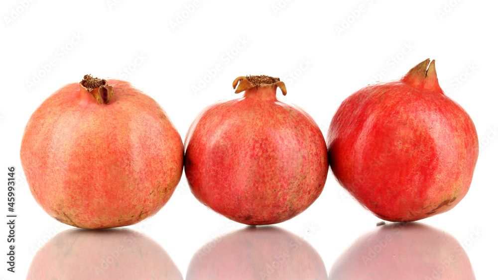 Ripe pomegranates isolated on white Ripe pomegranates isolated on white
