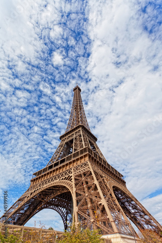 Eiffel Tower against the blue sky and clouds. Paris. France. © Shchipkova Elena