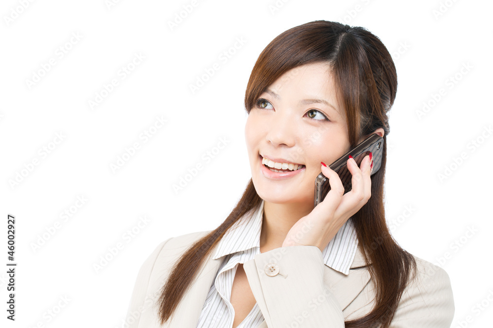 Beautiful young businesswoman using a cellular phone. Portrait o Beautiful young businesswoman using a cellular phone. Portrait o