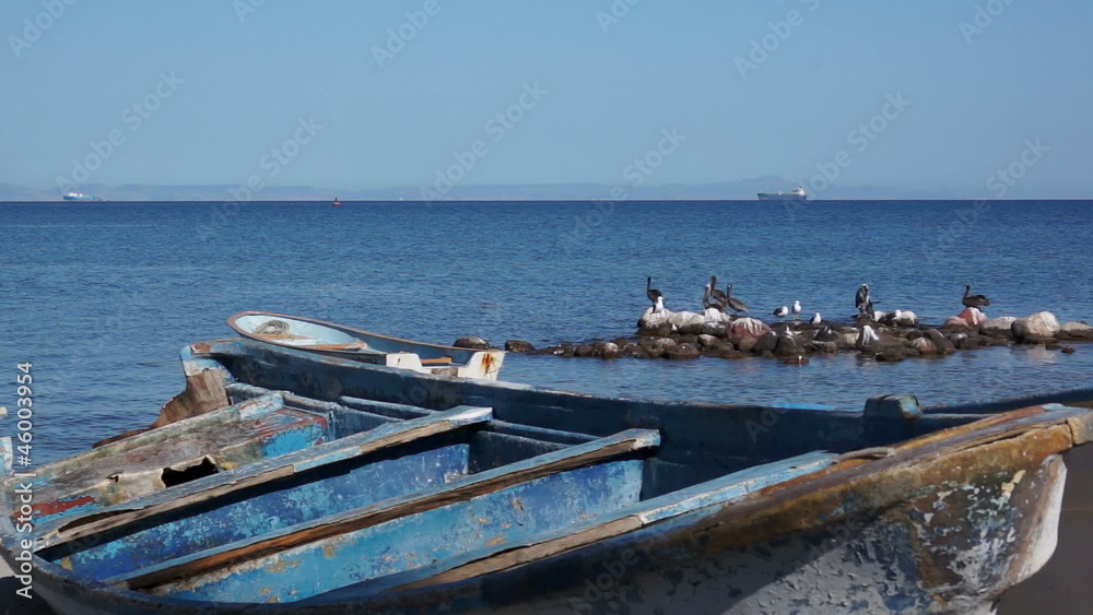 Old Wooden Boats on the Ocean Shoreline Old Wooden Boats on the Ocean Shoreline