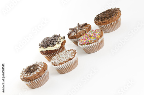 sweet muffins on white background