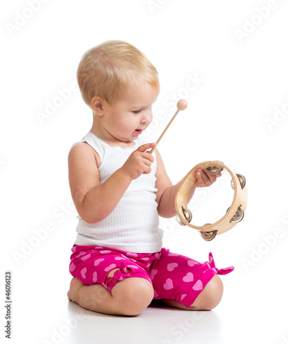 Baby playing with musical t...