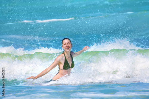 Happy girl splashing in the waves © vvvita