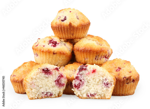 pile of raspberry muffins isolated on white