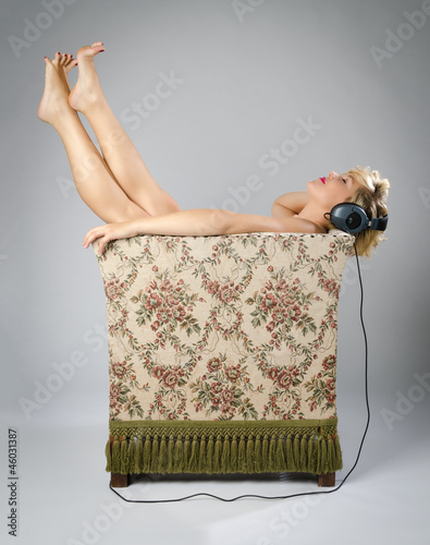 Woman listening to music in chair
