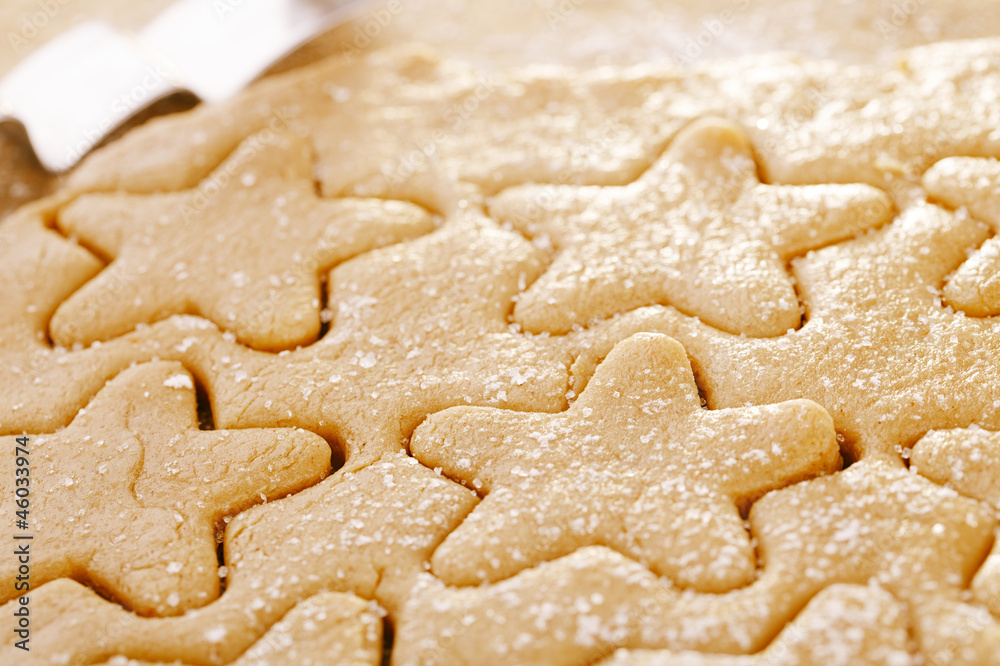 gingerbread  star cookie cuts dough