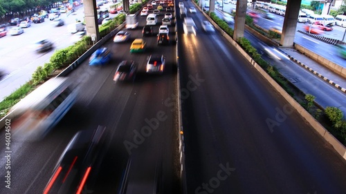 Cars running on highway roads are busy