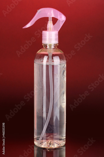 Pink air freshener on red background