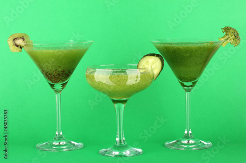 Three kinds of green juice in coctail glasses