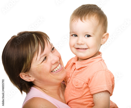 Portrait of a happy mother hugging her son