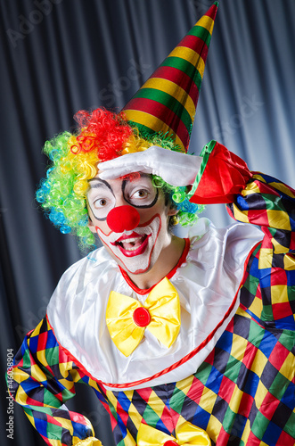 Funny clown in studio shooting