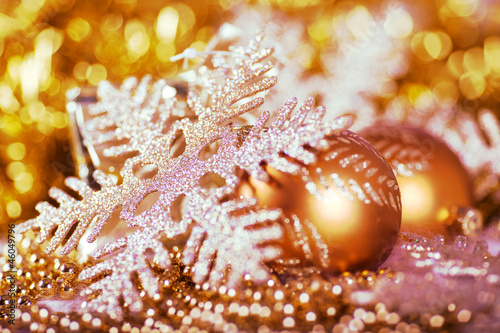 Greeting card with Christmas ball and snowflake in gold design