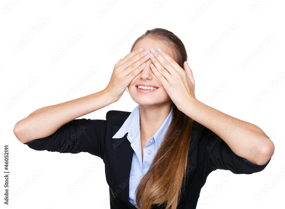 Cheerful young woman covering eyes with her hands isolated Cheerful young woman covering eyes with her hands isolated