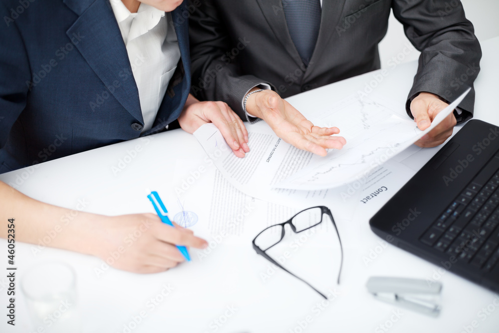 Close up of businessman's hands signing a contract