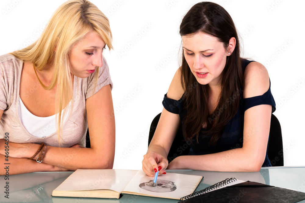 Two beautiful student girls getting ready for school Two beautiful student girls getting ready for school
