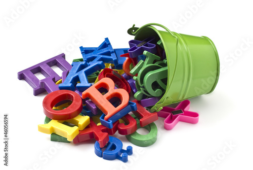 Bright letters in green bucket on white