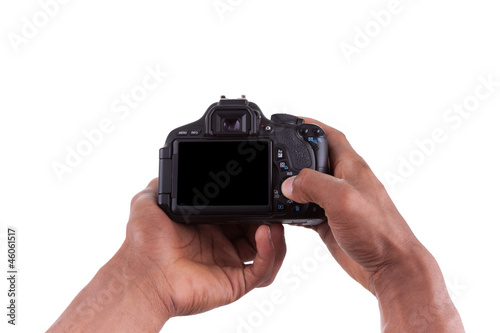 African american photographer holding a digital camera