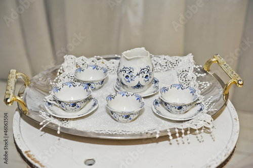 Mothers Porcelain.Old tea cups on the tray