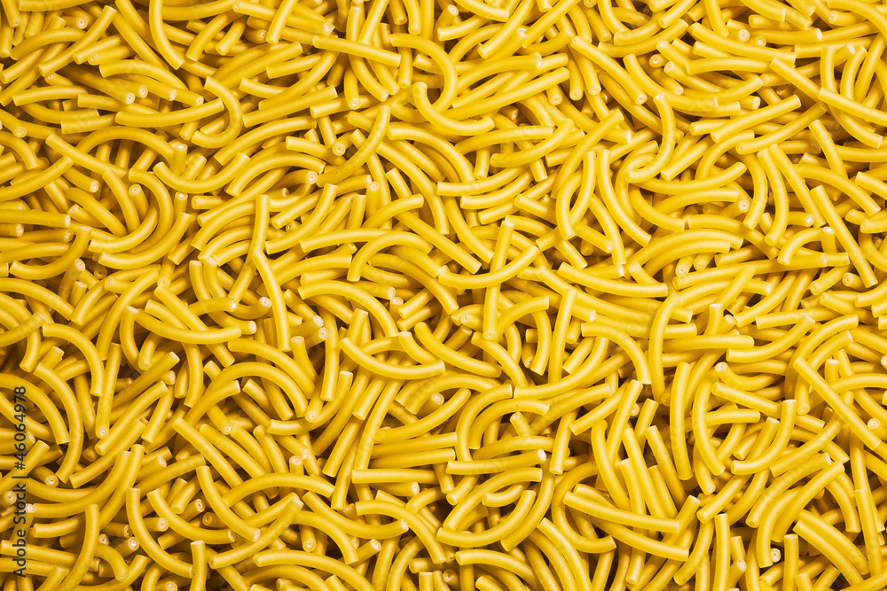 extra class yellow pasta noodles close-up background