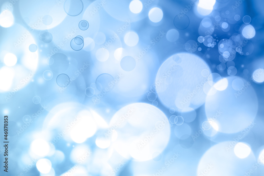 Abstract blue and white blurred circles background