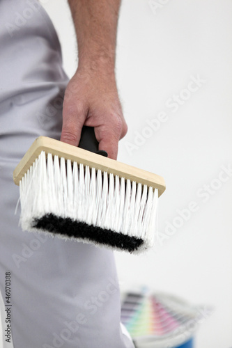 painter holding a brush