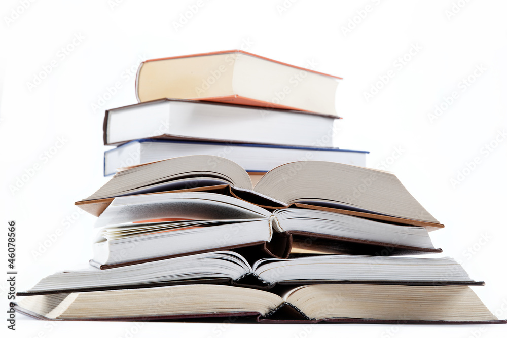 A stack of books on a white background.