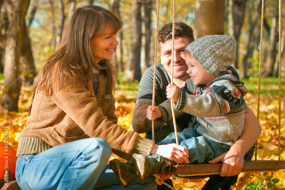 Happy family relaxing outdoors