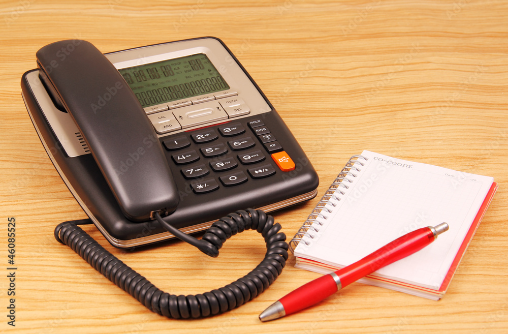 Phone, notebook, pen.