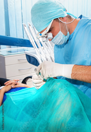 Dentists operate on a tooth