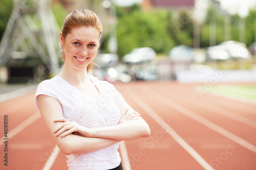 Business woman at athletic stadium