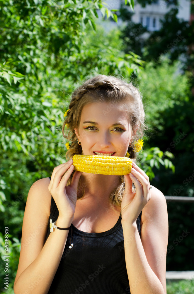 woman eating corn-cob