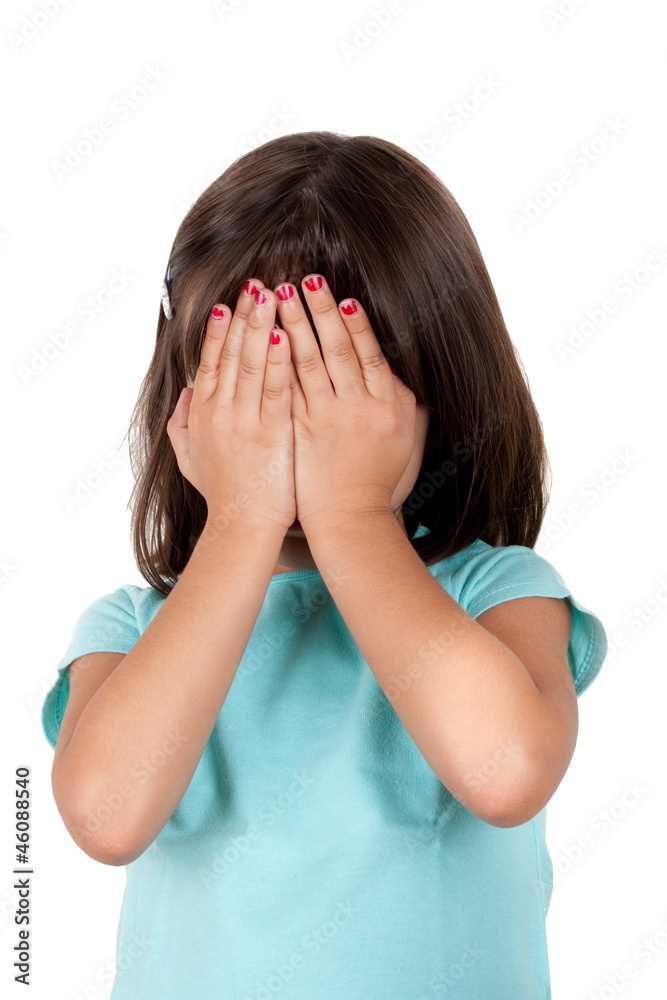 Little girl covering her face with her hands Little girl covering her face with her hands