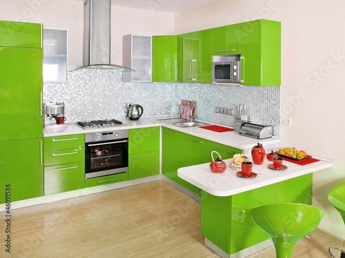 Modern kitchen interior with green decoration