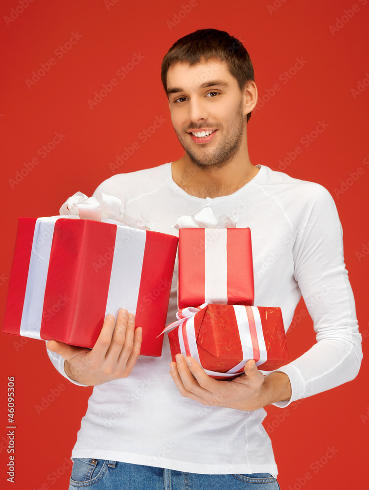 man holding many gift boxes man holding many gift boxes