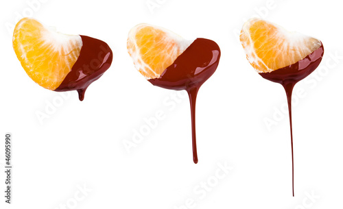 mandarin dipped in melting dark chocolate 