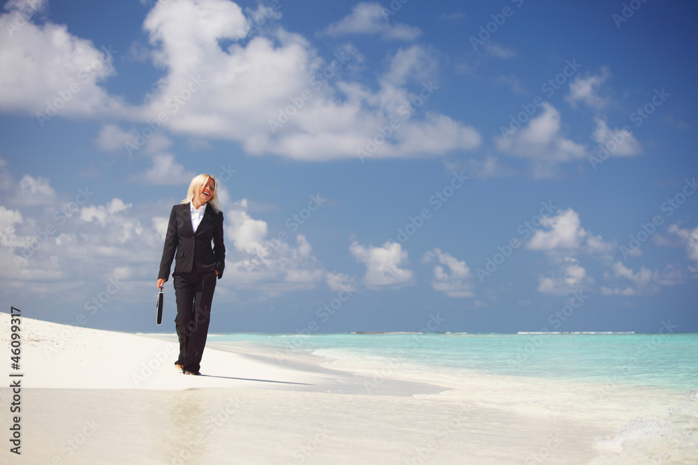 business woman on the ocean coast