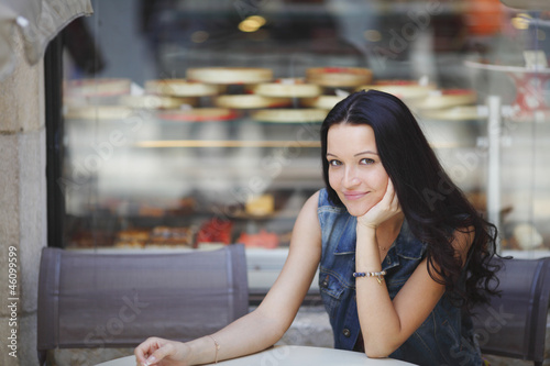 woman in street cafe