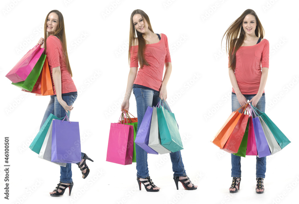three girls out shopping with colored bags, standing full