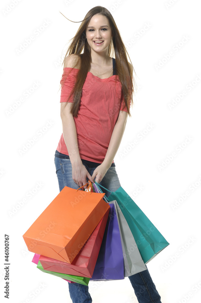Full length shopping girl posing in the studio Full length shopping girl posing in the studio