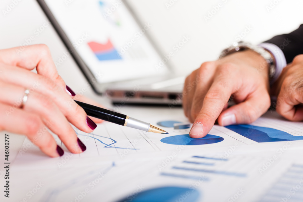 Business people discussing during a meeting Business people discussing during a meeting