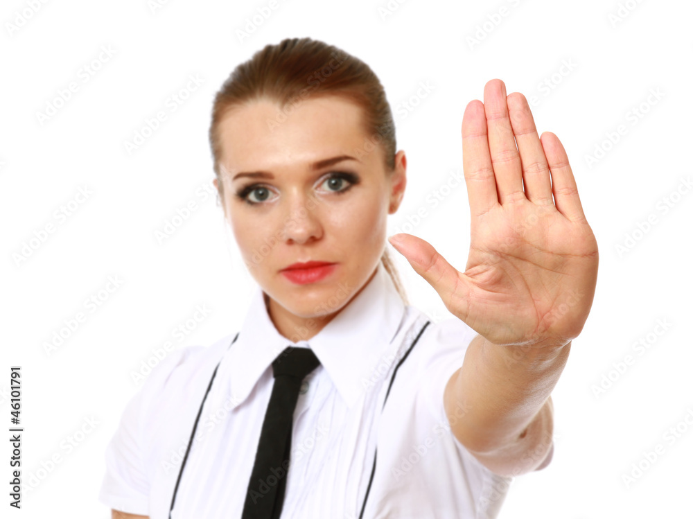 Woman smiling and showing his hand in signal of stop Woman smiling and showing his hand in signal of stop