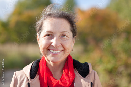 Outdoor portrait of mature woman