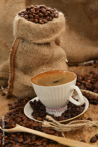 Coffee beans and cupCoffee beans and cup photo